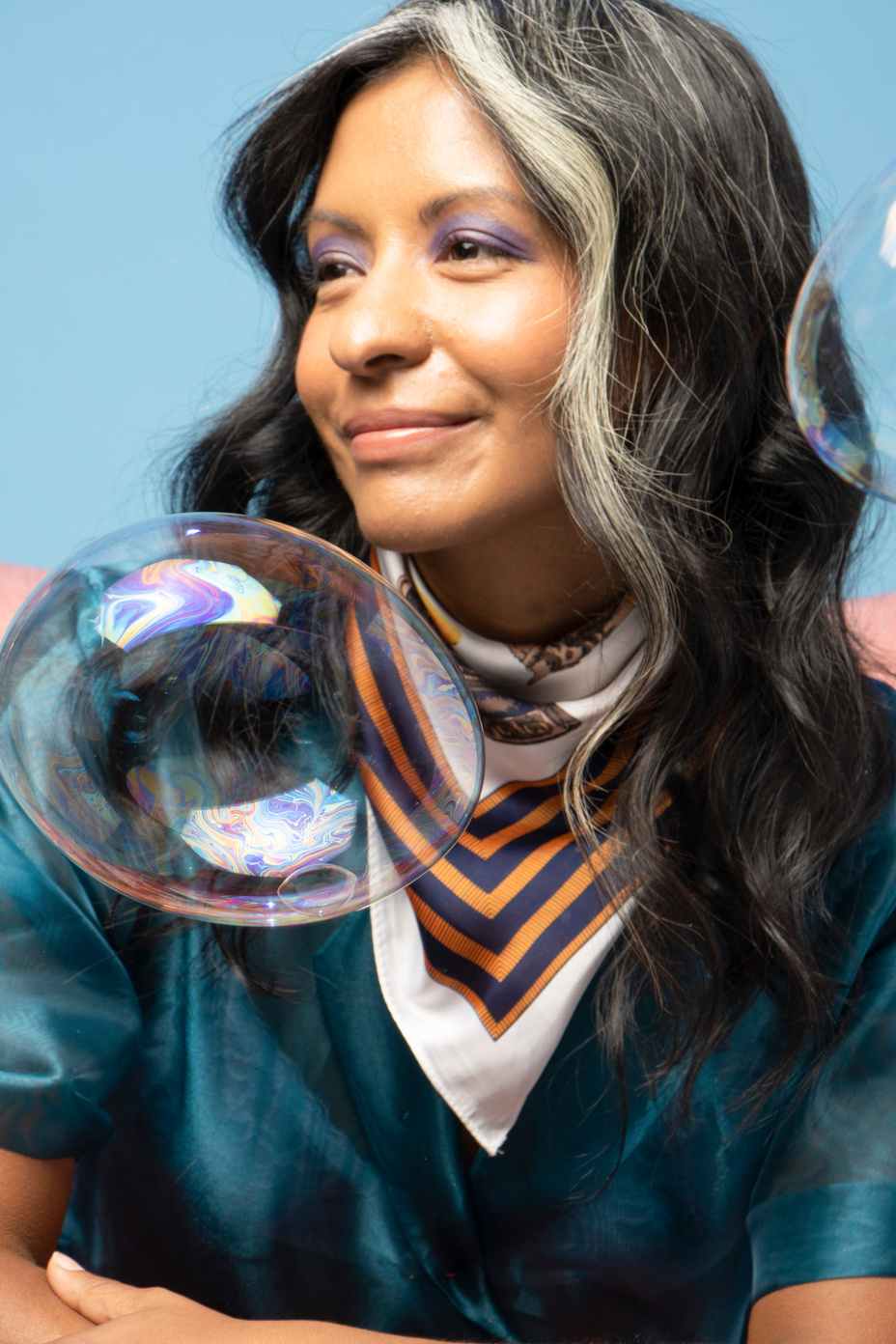 Portrait of a Smiling Woman with Bubbles